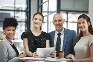 Business team collaborating and celebrating success together