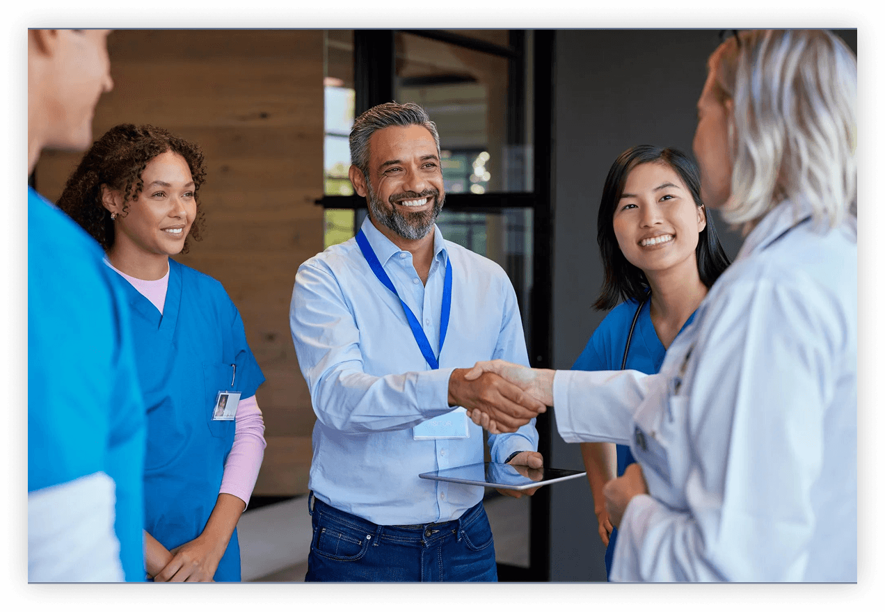 Healthcare professional meeting with a colleague